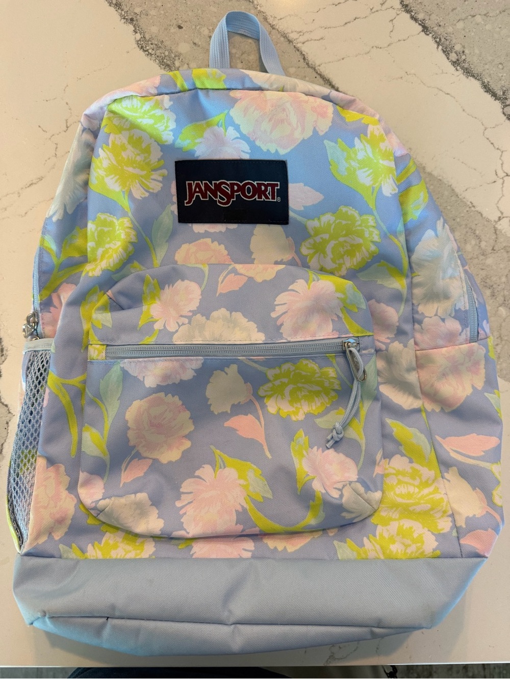 JanSport Light Blue Floral Backpack with Pastel Yellow & Pink Blooms